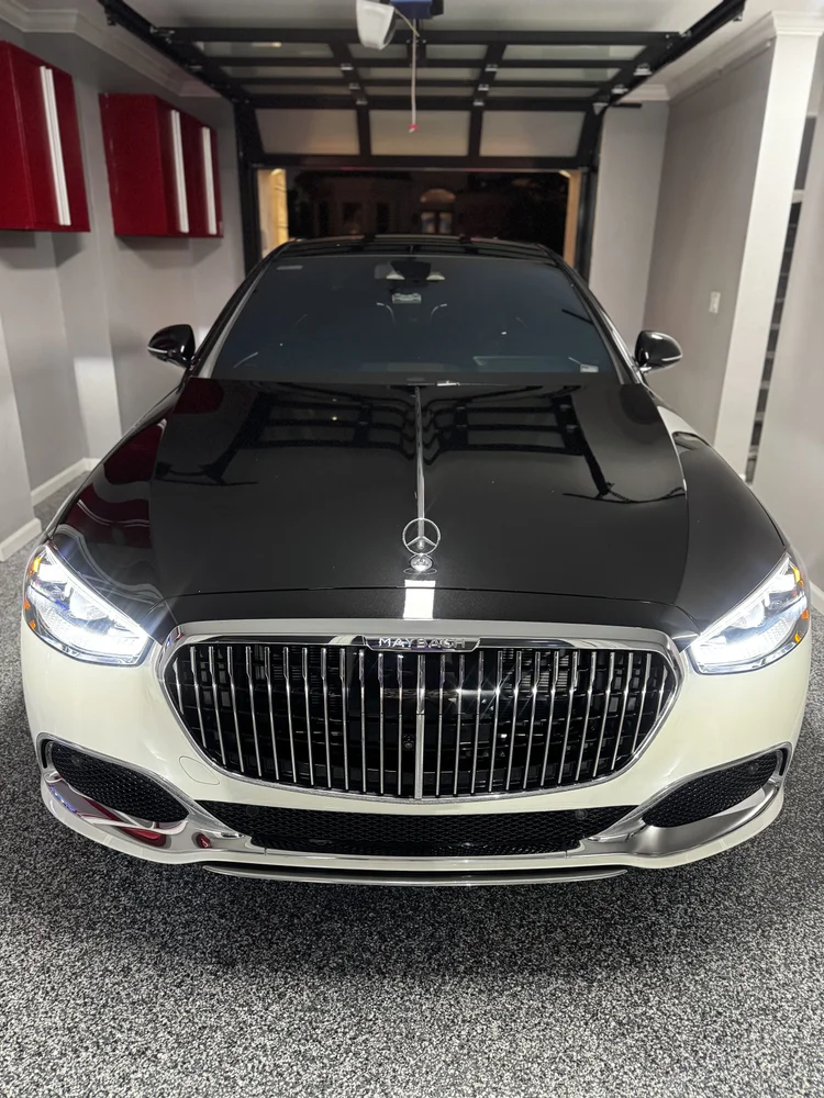 Black Mercedes-Maybach with a ceramic coated finish in a Tampa garage