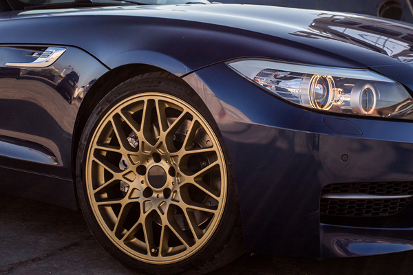 Bronze wheel on a ceramic coated BMW detailed in Tampa