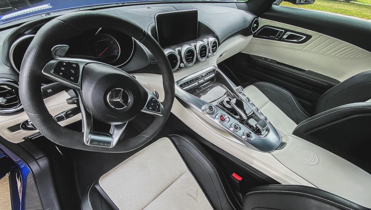 White leather interior of a Mercedes-AMG GT after an interior ceramic coating
